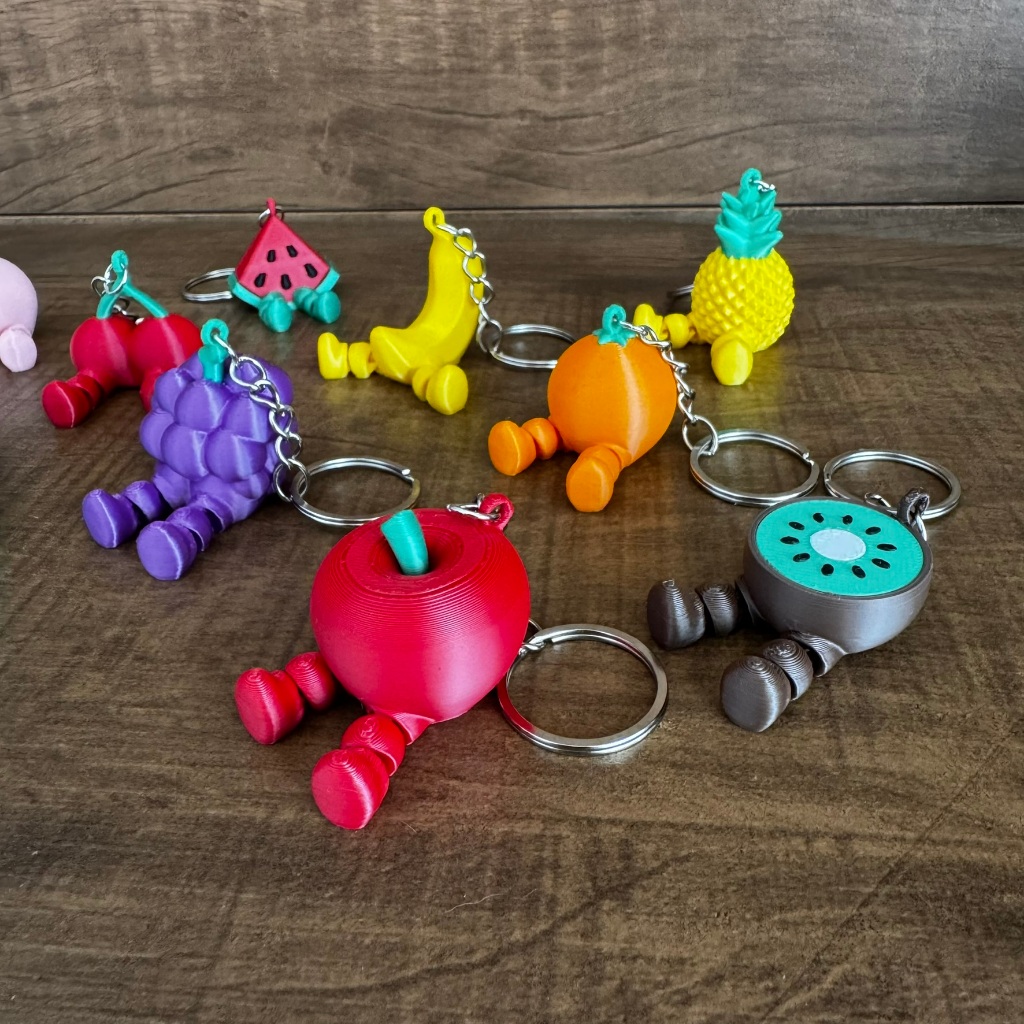 Chaveiro Frutinhas com Perninhas Maçã Uva Pera Abacaxi Com Argola - Imagem 3